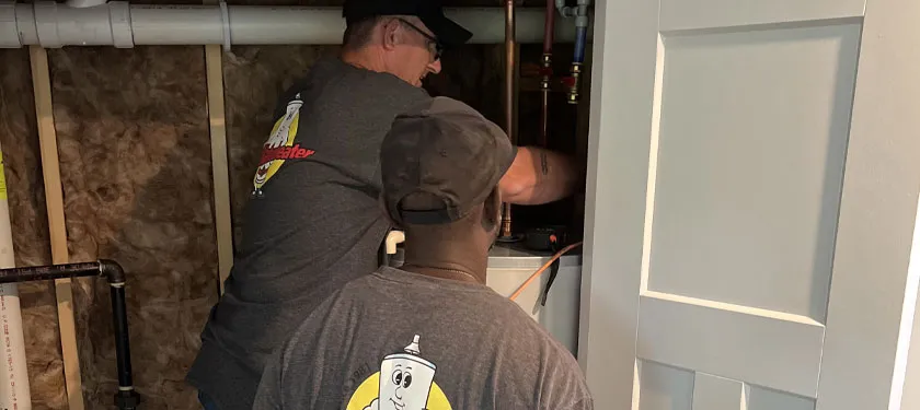Two Mr. Waterheater technicians performing a Residential Water Heater Installation